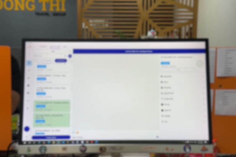 Operations team briefing and flight monitoring screen for group arrival coordination at Vietnam airport